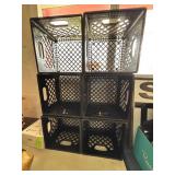 Six Black Plastic Milk Crates