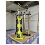 Two Sports Trophies With Figures
