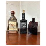 Three Whiskey Collectible Bottles