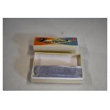 Pair of New Neat O Metal Harmonicas