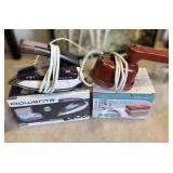 Two Rowenta First Class and One Travel Steam Irons
