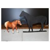 Plastic Horse Toy and Metal Horse Statue