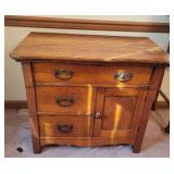 Oak Cabinet With Drawers and Door