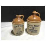 Two McCormick Whiskey Jugs