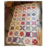 Patchwork Quilt with Scalloped Edges