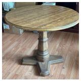 Round Wooden Pedestal Table