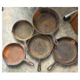 Five Cast Iron Skillets
