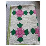 Hand-Stitched Quilt with Floral Design