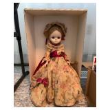 Vintage Porcelain Doll with Floral Dress and Bonne