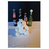 Coca Cola Bottles and Bear Plush