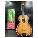 Electric Yule K Lele and Child's Guitar