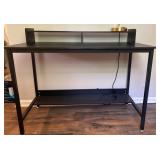 Small Black Desk and Gold Lamp