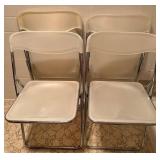 Four Folding Chairs