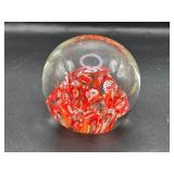 Red and Clear Glass Paperweight
