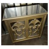 Gold Mirrored Cabinet w/ Ornate Scroll Doors