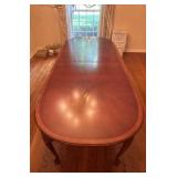 Elegant Wooden Dining Table with Covers