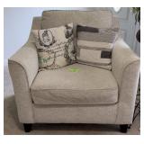 Beige Upholstered Armchair w/ Two Pillows