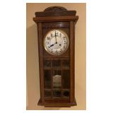 Wall-Mounted Pendulum Clock with Glass Front