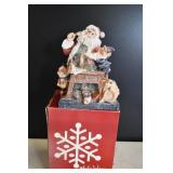 Kirklands Resin Santa Checking HIs List