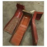 Three Red Metal Car Ramps