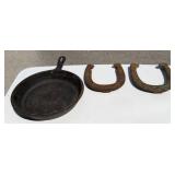 Cast Iron Skillet w/ Two Metal Horseshoes