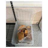 Plastic Bin with Wood Pieces