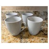 Four White Ceramic Mugs4'