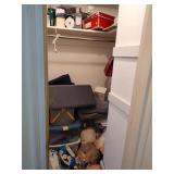 Contents of Closet on Right Side of TV Room