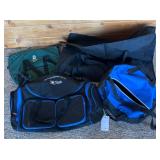 Four Duffel Bags with Logos