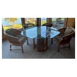 Glass-Top Table with Wicker Base and Four Chairs