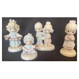 Four Precious Moments Figurines by Enesco