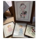 Four Framed Embroidered Items Depicting Children