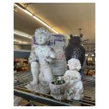 Two Garden Yard Statues