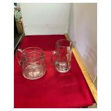 2 Heisey Glass Pitchers