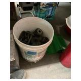 Bucket of Porcelain Electrical Insulators
