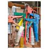 Assorted Caulking Guns and Adhesive Tubes - Essent