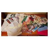 Assorted Crafting Supplies and Patterns for Variou
