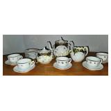 Vintage Porcelain Tea Set with Gold Accents and Fl