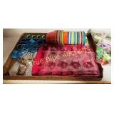 Assorted Craft Supplies Including Molds, Cups, and