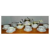 Vintage Porcelain Tea Set with Gold Accents and Fl