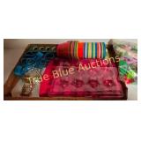 Assorted Craft Supplies Including Molds, Cups, and
