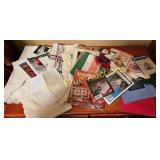Assorted Crafting Supplies and Patterns for Variou