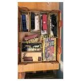 Box of Model Train Cars and Accessories