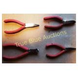 Assorted Hand Tools Including Pliers, Stapler, and