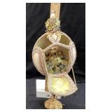 HAND CARVED DECORATIVE OSTRICH EGG, CHILD & F