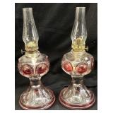 PAIR OF RUBY BULLSEYE OIL LAMPS, 9.5in H