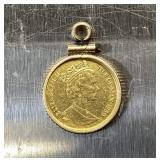 1989 ISLE OF MAN 1/25 OZT GOLD COIN IN BEZEL