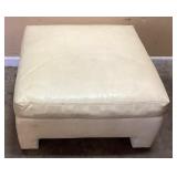 CREAM COLORED OTTOMAN