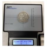 1884 O Morgan silver dollar