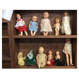 2 SHELVES OF ASSORTED DOLLS